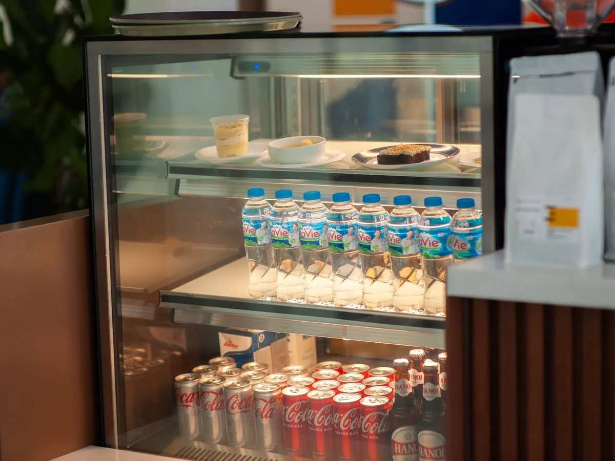 Refrigerated display case with drinks and desserts